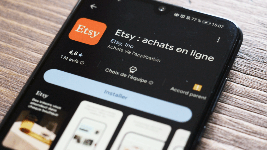 Mobile phone with Etsy application on the screen.